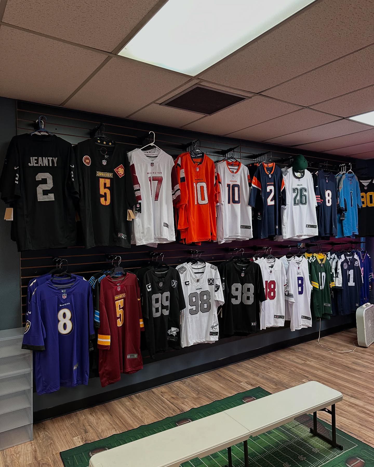 NFL jerseys hanging in the shop